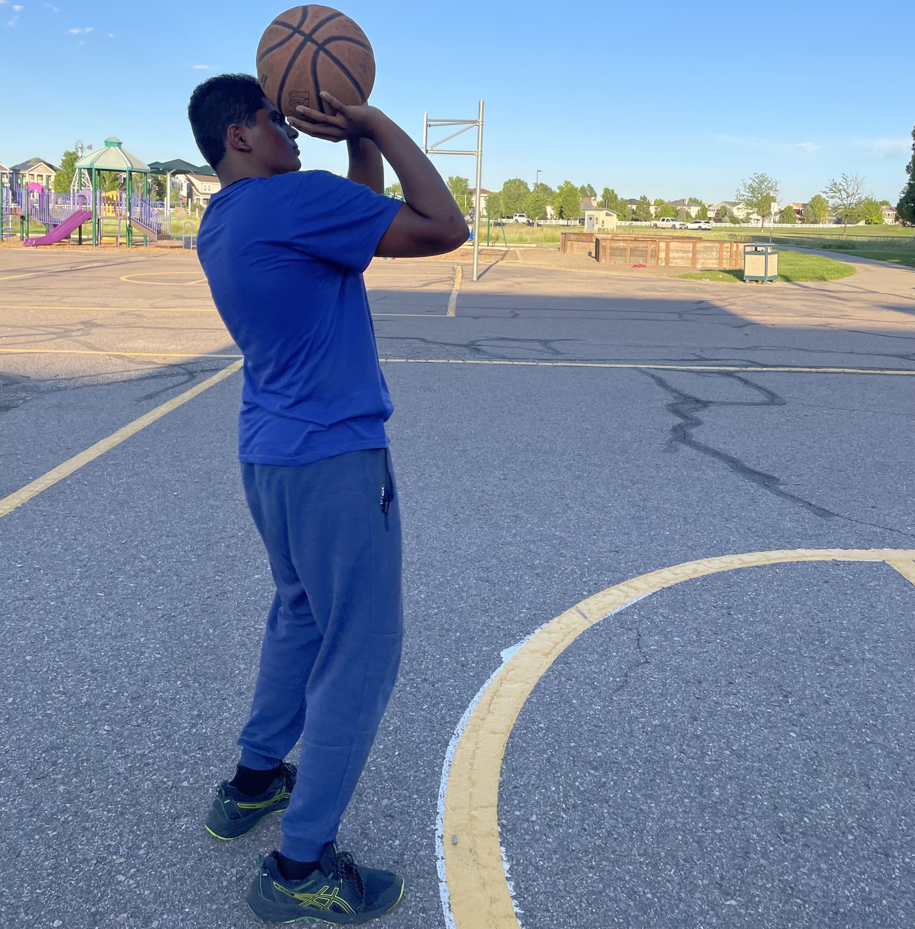 Placeholder: Vikram shooting a basketball